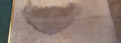 Image of a sword carved into the stone floor indicating the position of a Knight's grave
